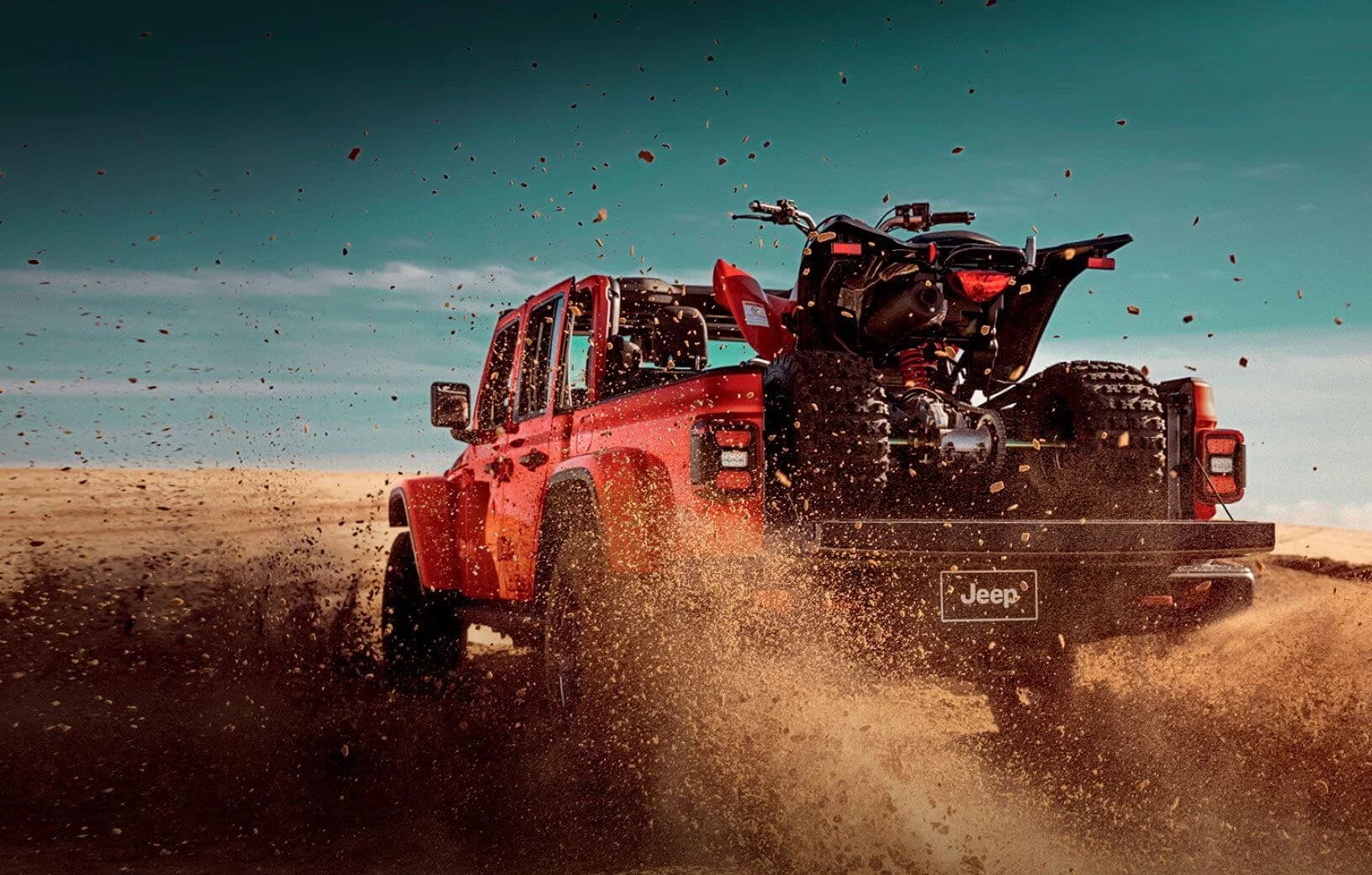 Foto de uma Jeep Gladiator vermelha com capacidade de carga
